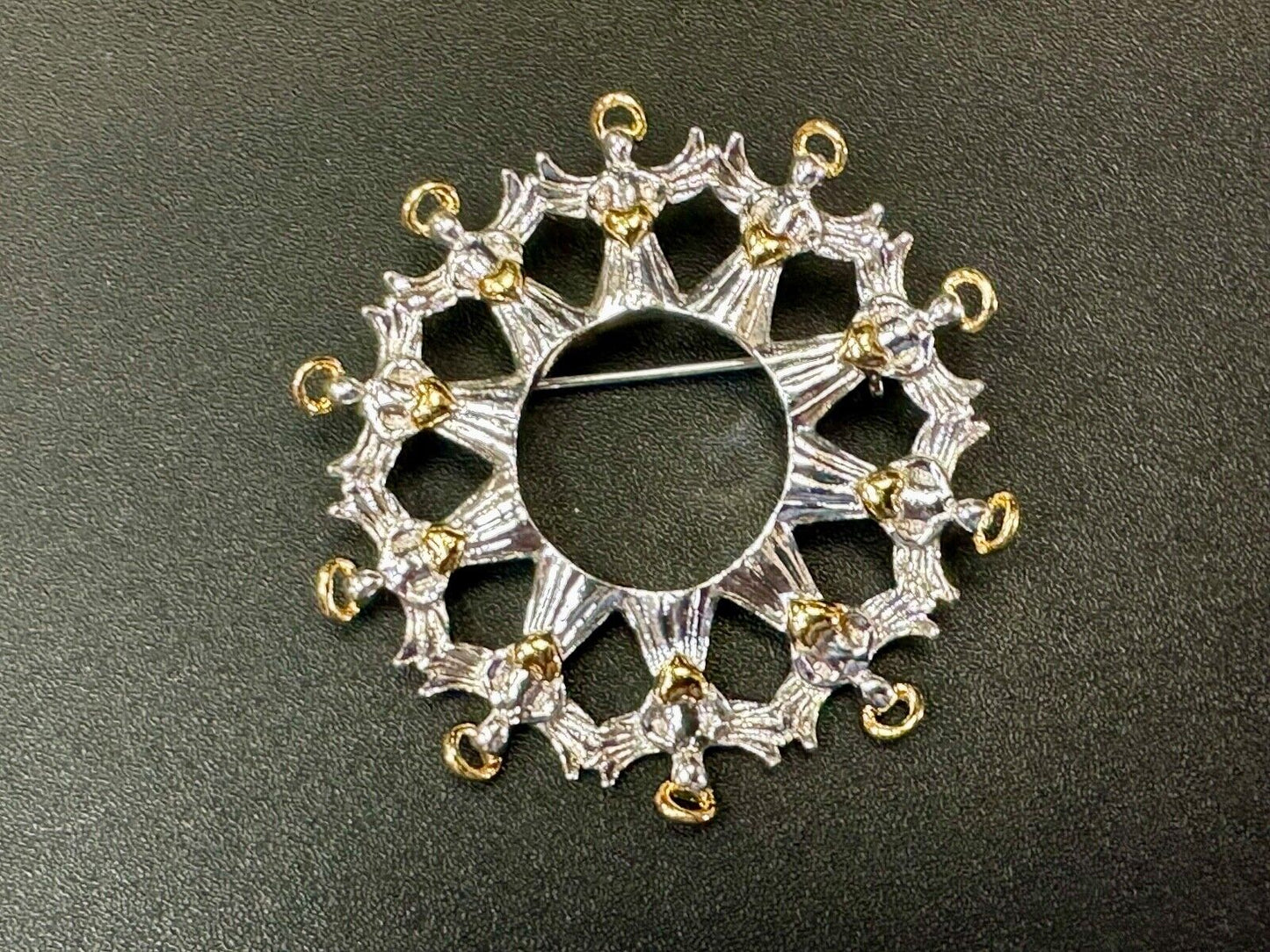 Angles in Circular pattern holiday wreath Avon signed vintage brooch pin