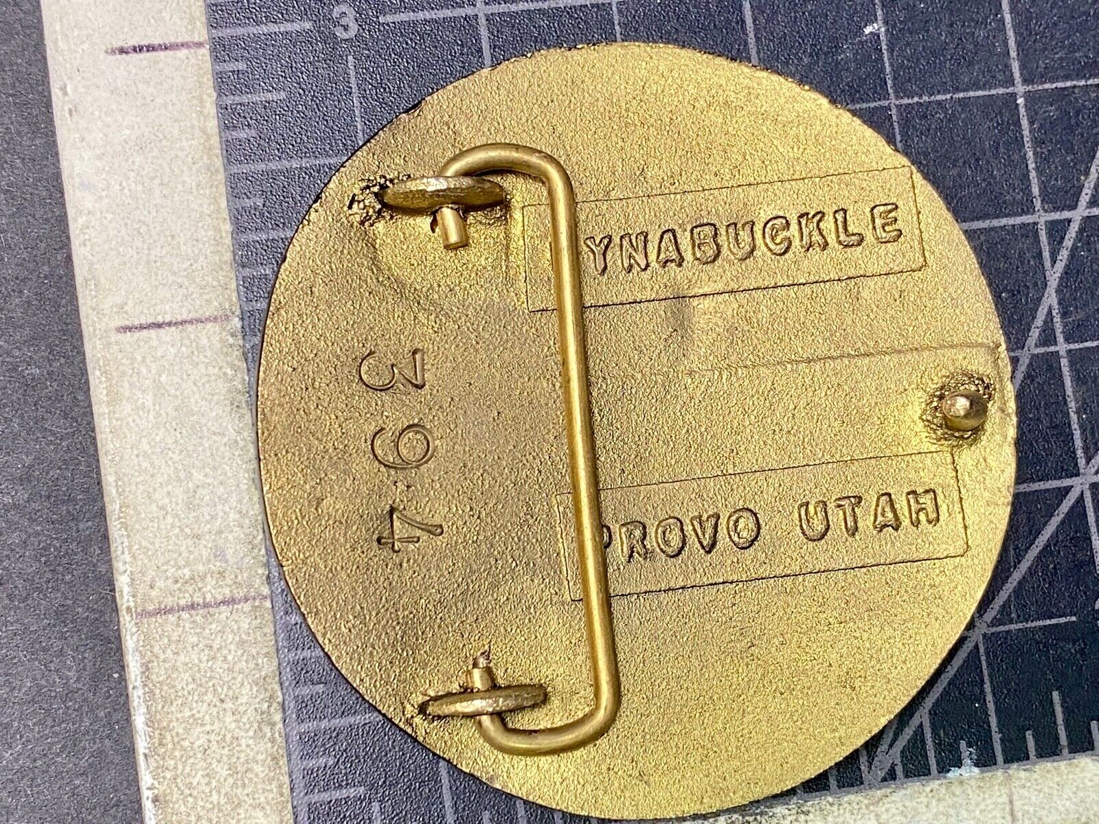 Astralloy Vis a unique, deep-air hardened steel promotional brass belt buckle 