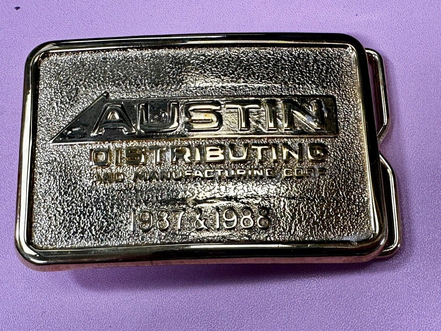 Austin Texas Distributing and Manufacturing 1987 - 1988 Gold Tone Belt Buckle