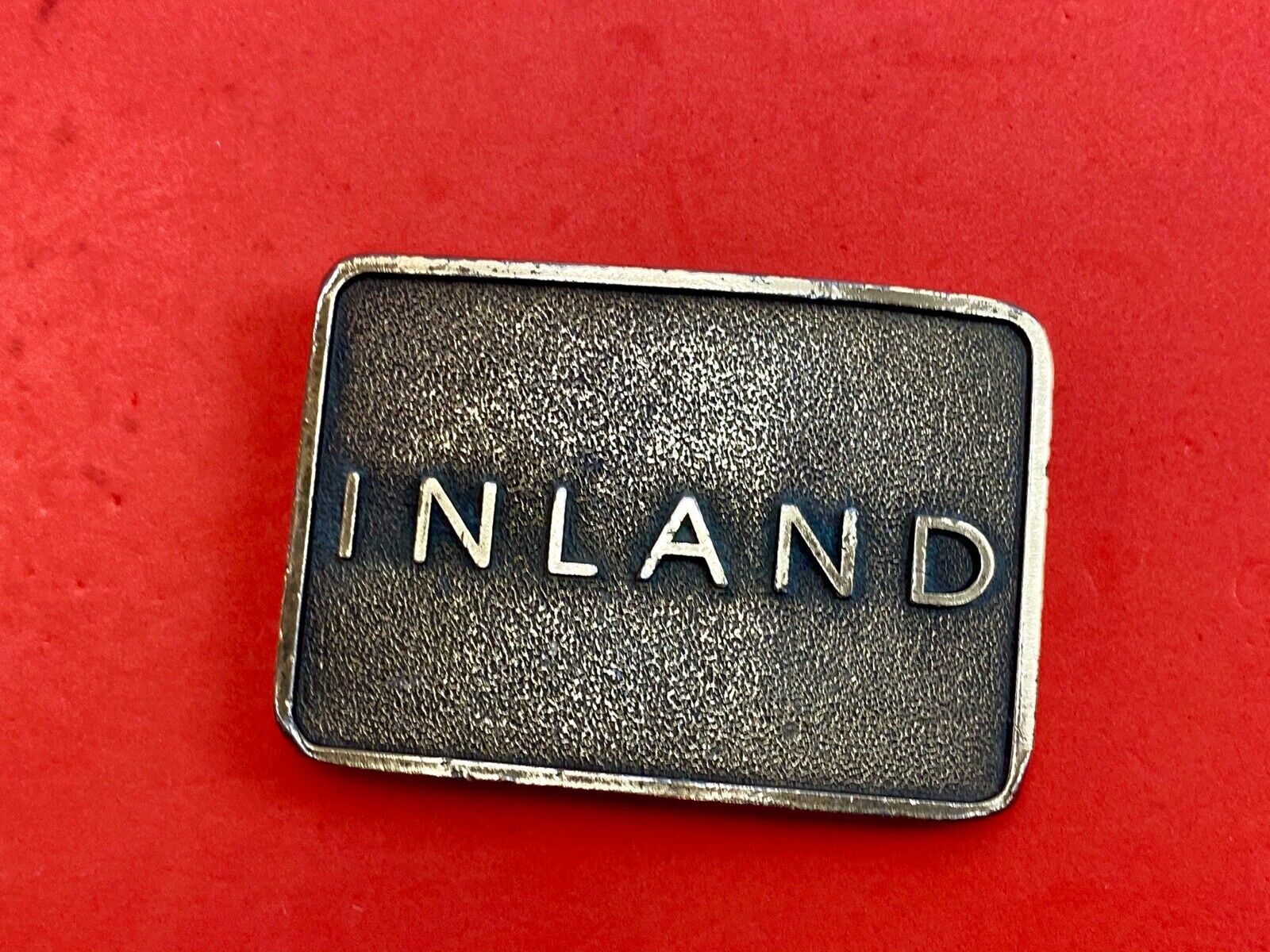 Vintage Inland company belt buckle - truck parts company 