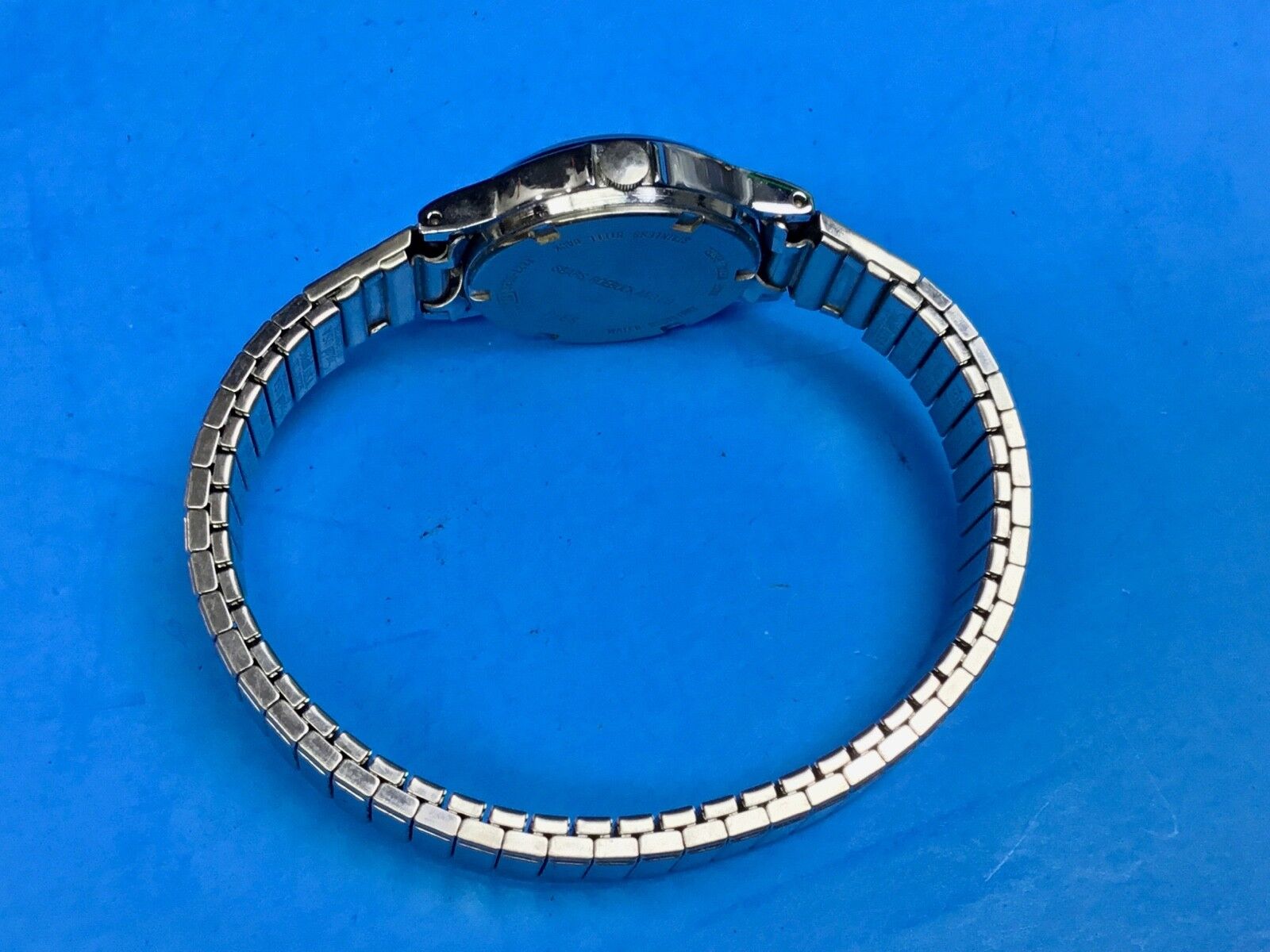 Vintage  Ladies Silver Tone Watch Phasar Quartz Date Stretch V227-0130 R 