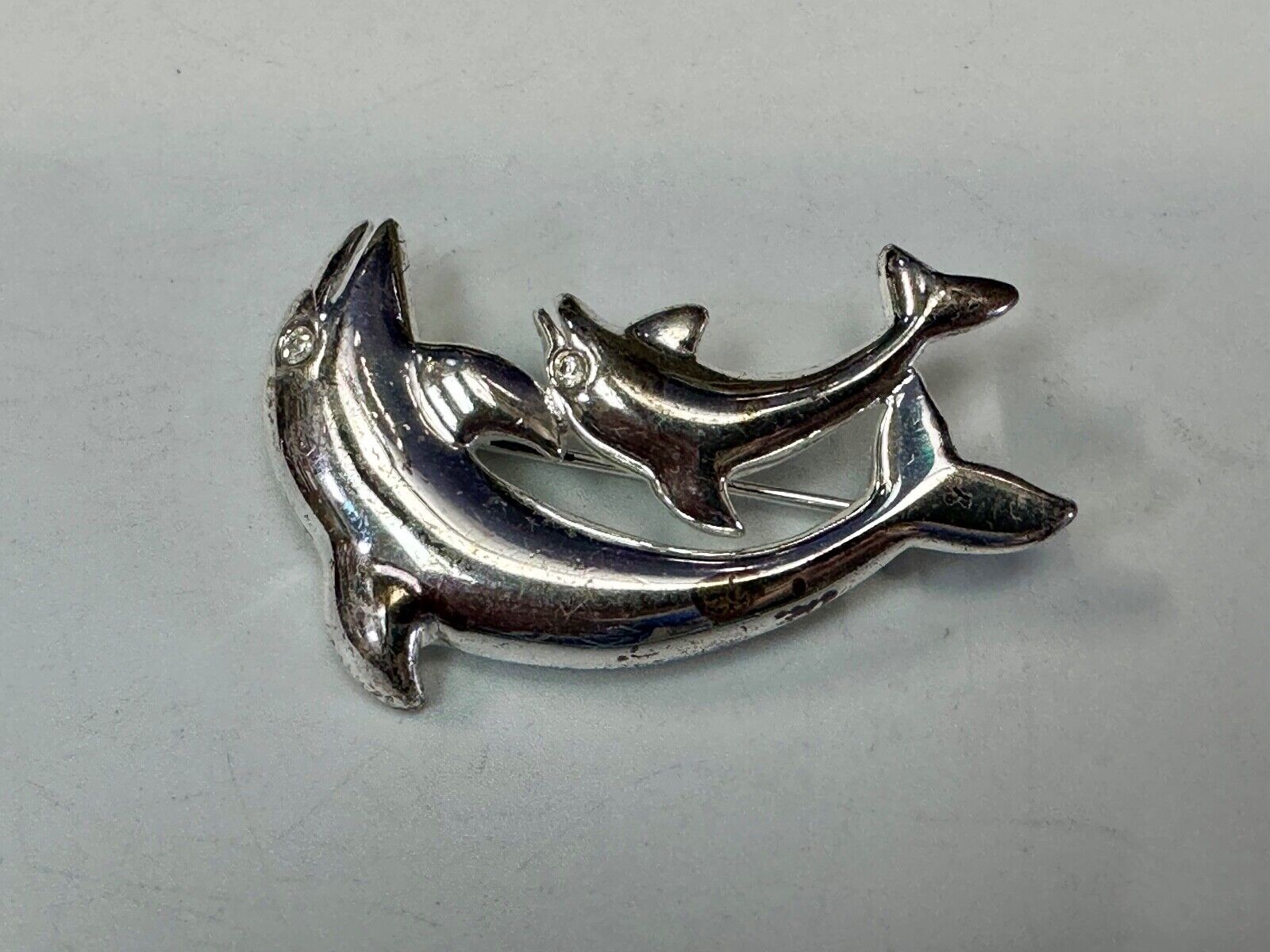 Two  Dolphins Curved Jumping in ocean scene AK Anne Klein Brooch Pin