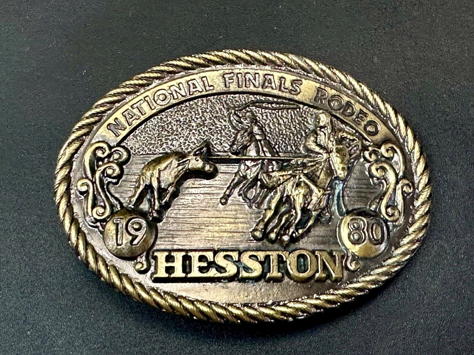 1980 NFR Rodeo Vintage Hesston Cow Roping Steer Wrestling Cowboy belt buckle