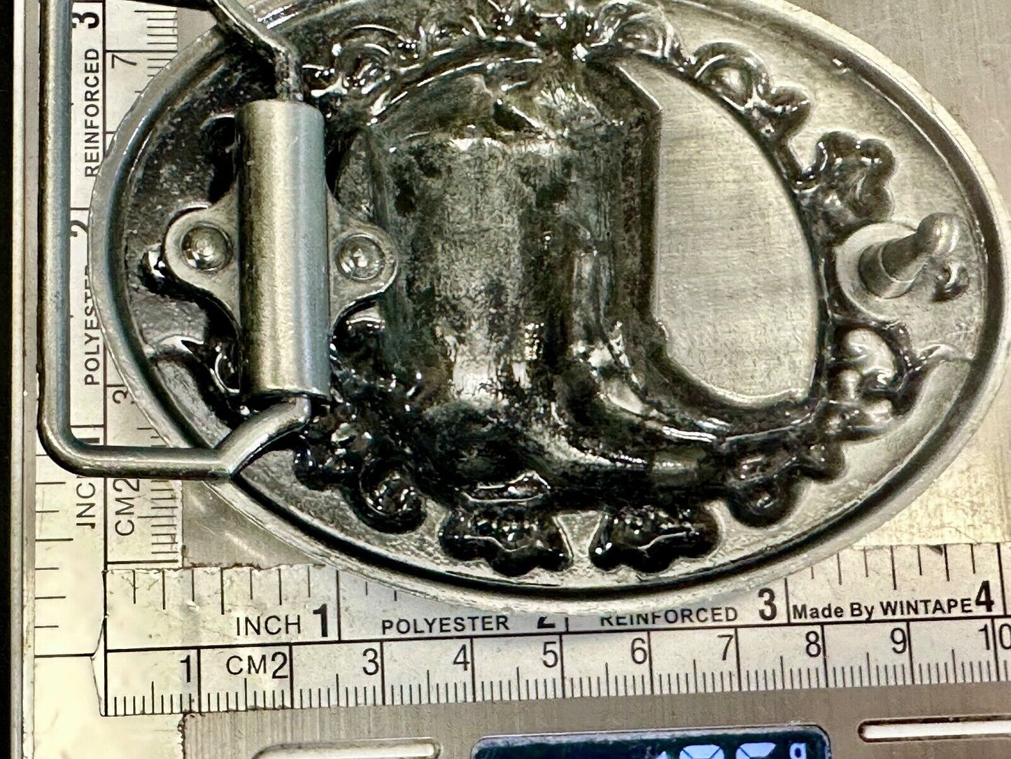 Western Cowboy Boots Belt Buckle with ornate flower swirl and rope boarder