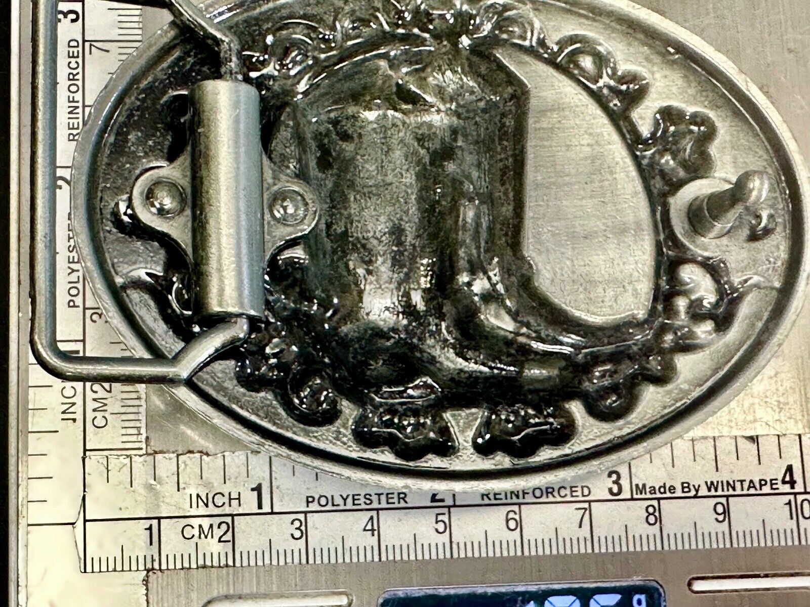 Western Cowboy Boots Belt Buckle with ornate flower swirl and rope boarder