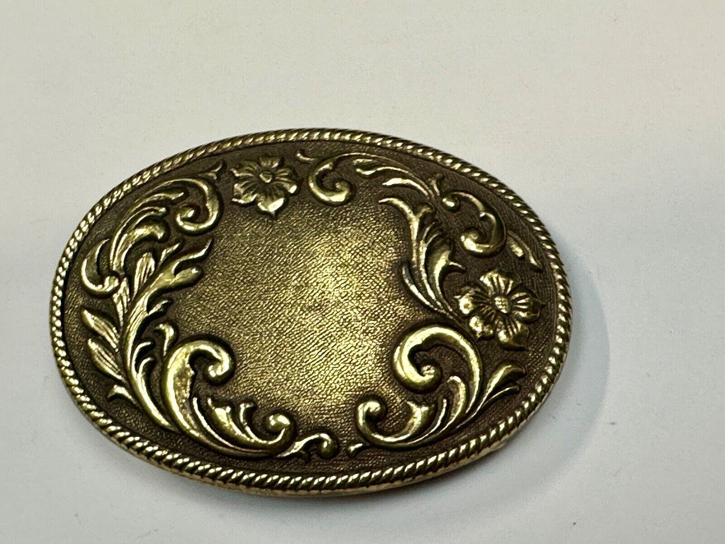USA made vintage western flower swirl design oval belt buckle marked W