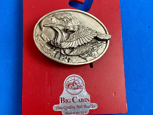 big cabin eagle head bust over mountains nature belt buckle on card 