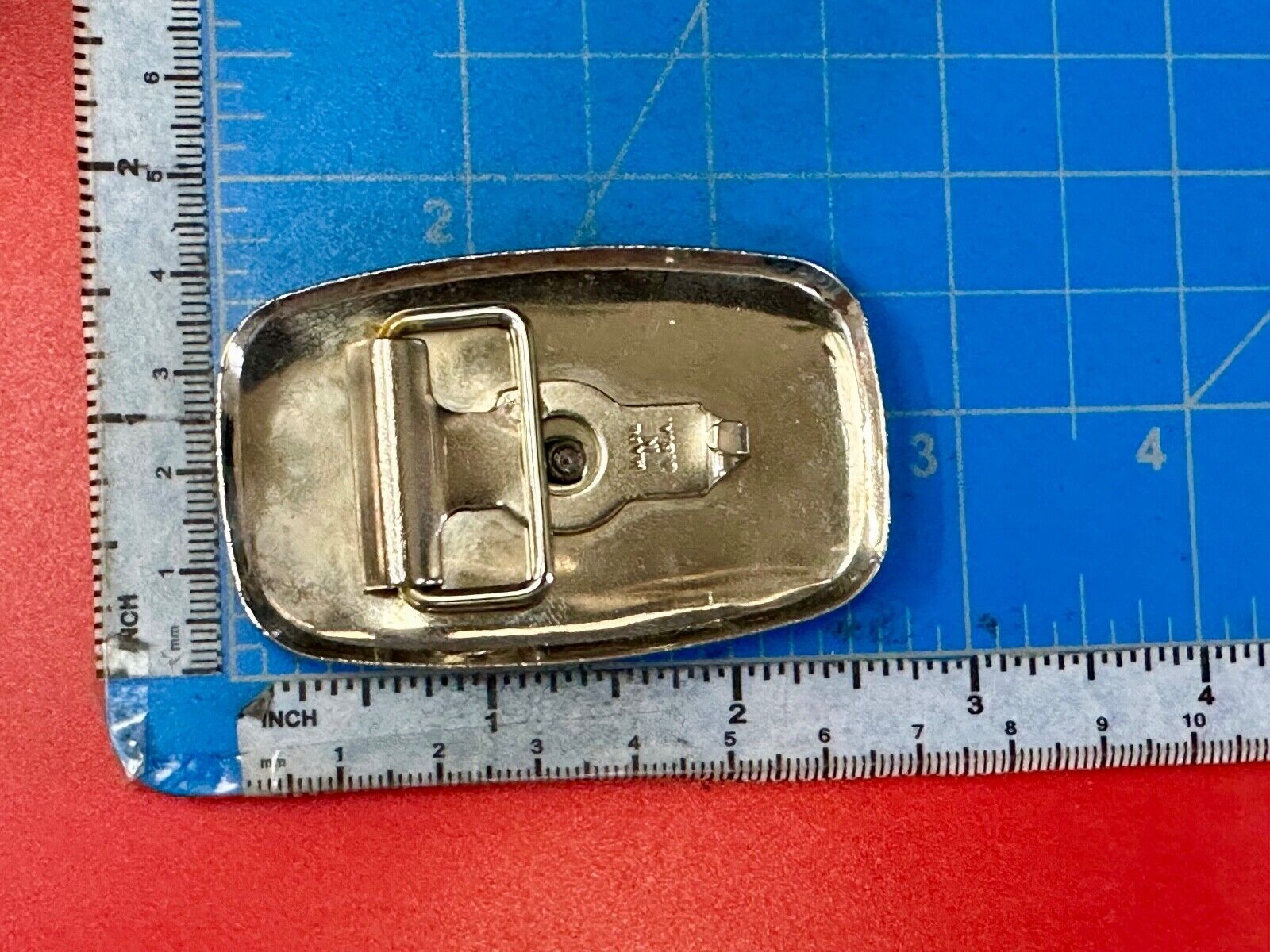 70s Covered Wagon two tone reflective rounded corner USA made belt buckle