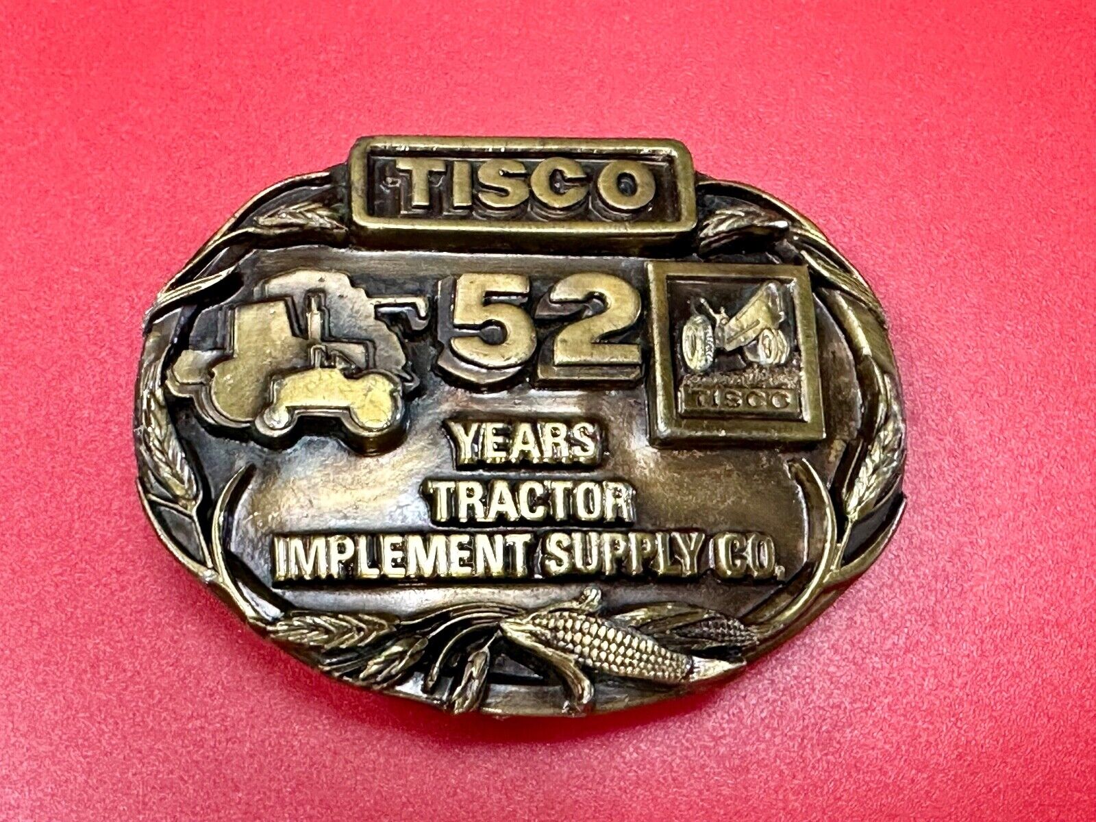TISCO 52 years commemorative belt buckle  Tractor Implement Supply