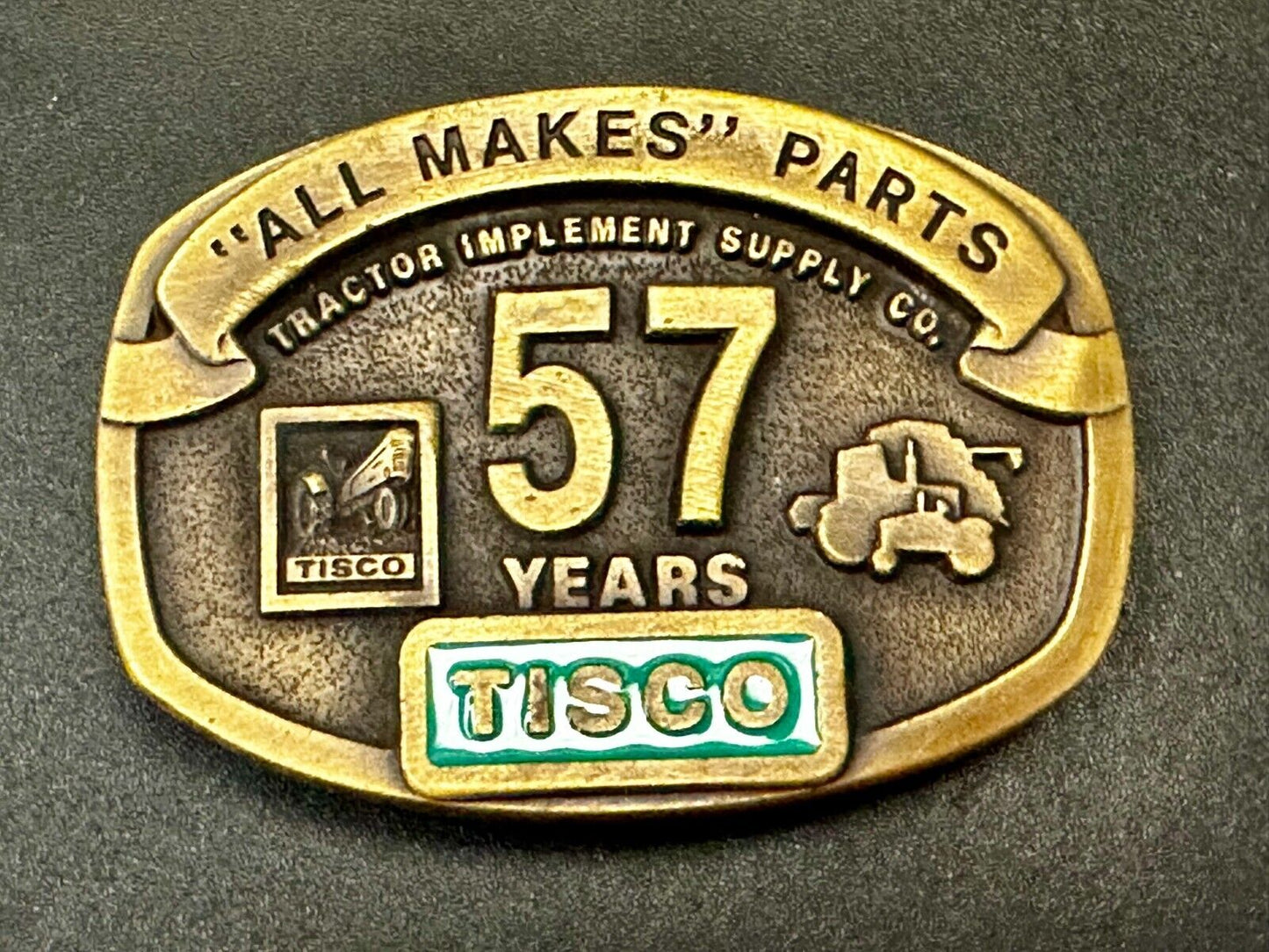 57 Years TISCO Tractor Implement Supply company NOS Belt Buckle by Speccast