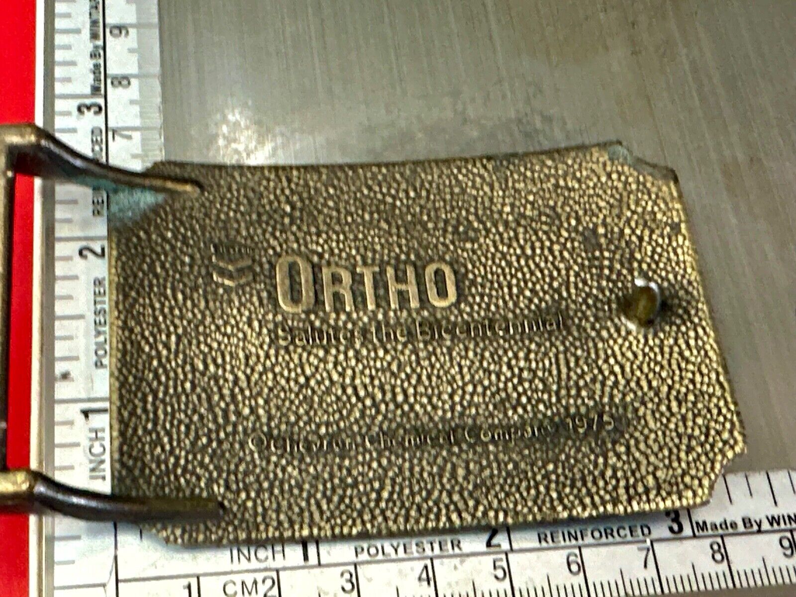 American Agriculture Bicentennial Celebration Ortho sponsored belt buckle