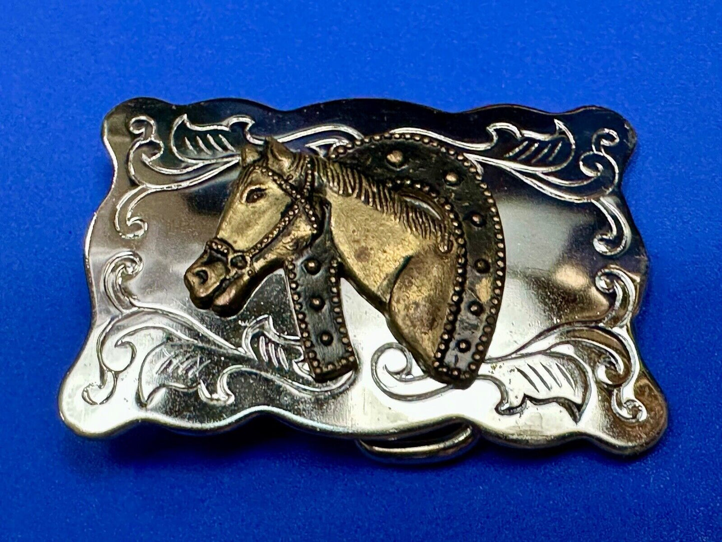 Vintage lucky horseshoe with head centerpiece on western two tone belt buckle
