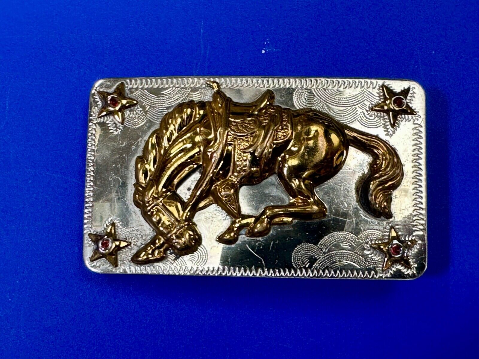 Vintage Horse w/  head down end of the trail Nickel Silver belt buckle w/ Stars