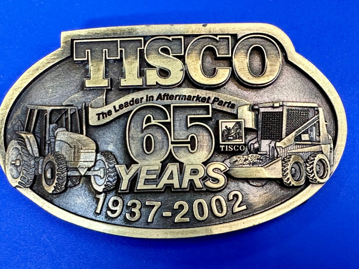TISCO 65 Years 1937-2002 Series XIV The Leader in Aftermarket Parts Belt Buckle