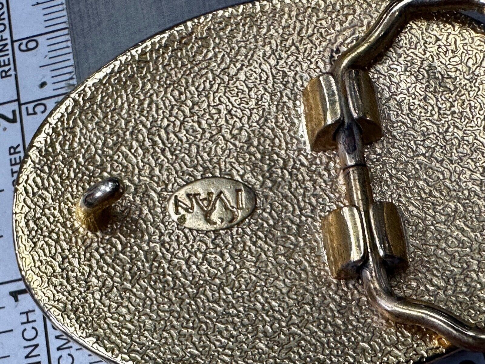 vintage Ivan Brand western flower swirl design two tone oval belt buckle