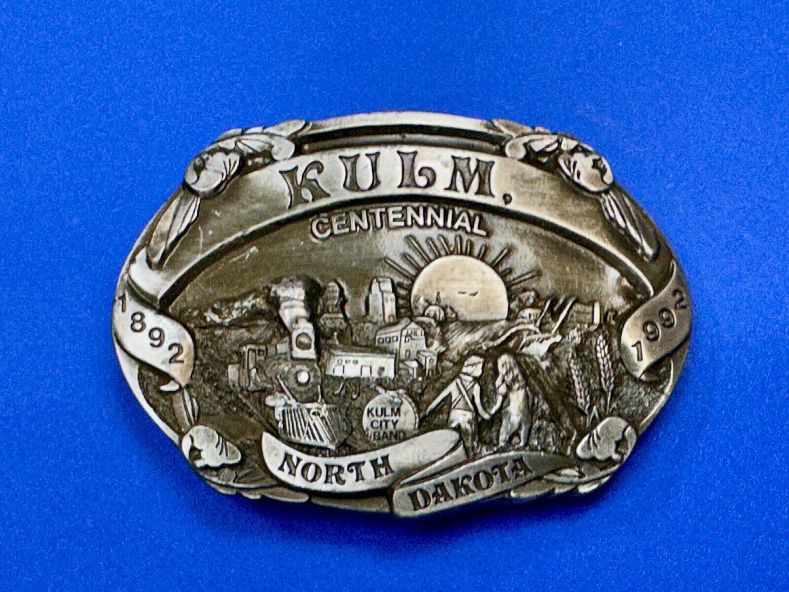 Vintage KULM North Dakota commemorative belt buckle by DART inc.