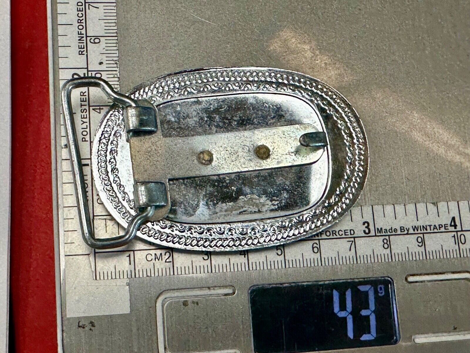 Vintage Covered Wagon on reflective oval two tone western belt buckle