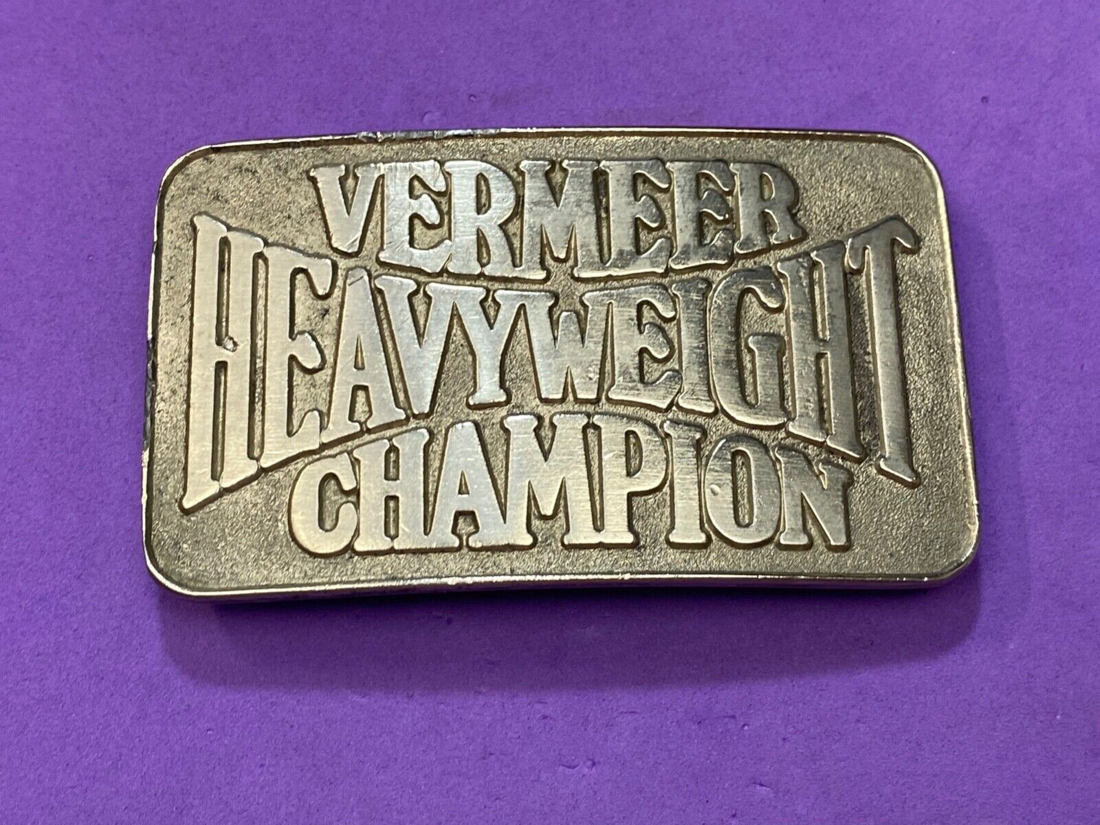Vermeer Heavyweight Champion Belt Buckle by Spec Cast