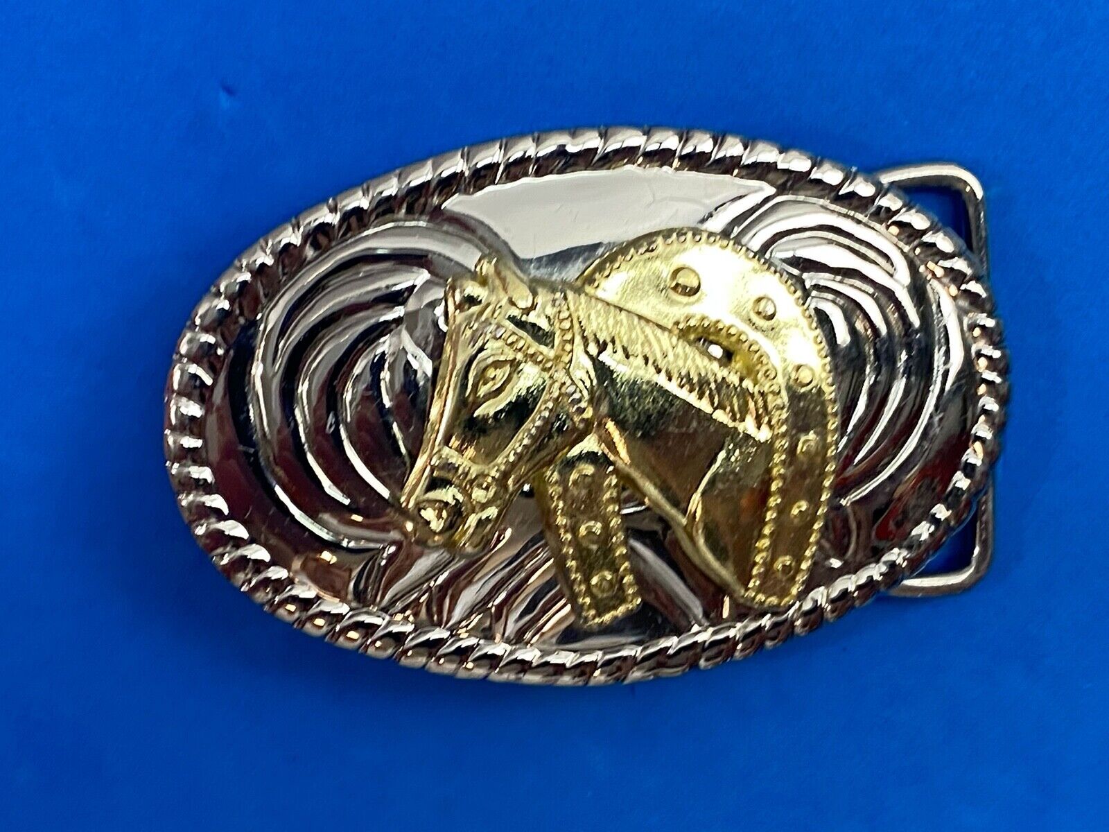 Two toned HORES HEAD BUST inside horseshoe western cowboy oval belt buckle