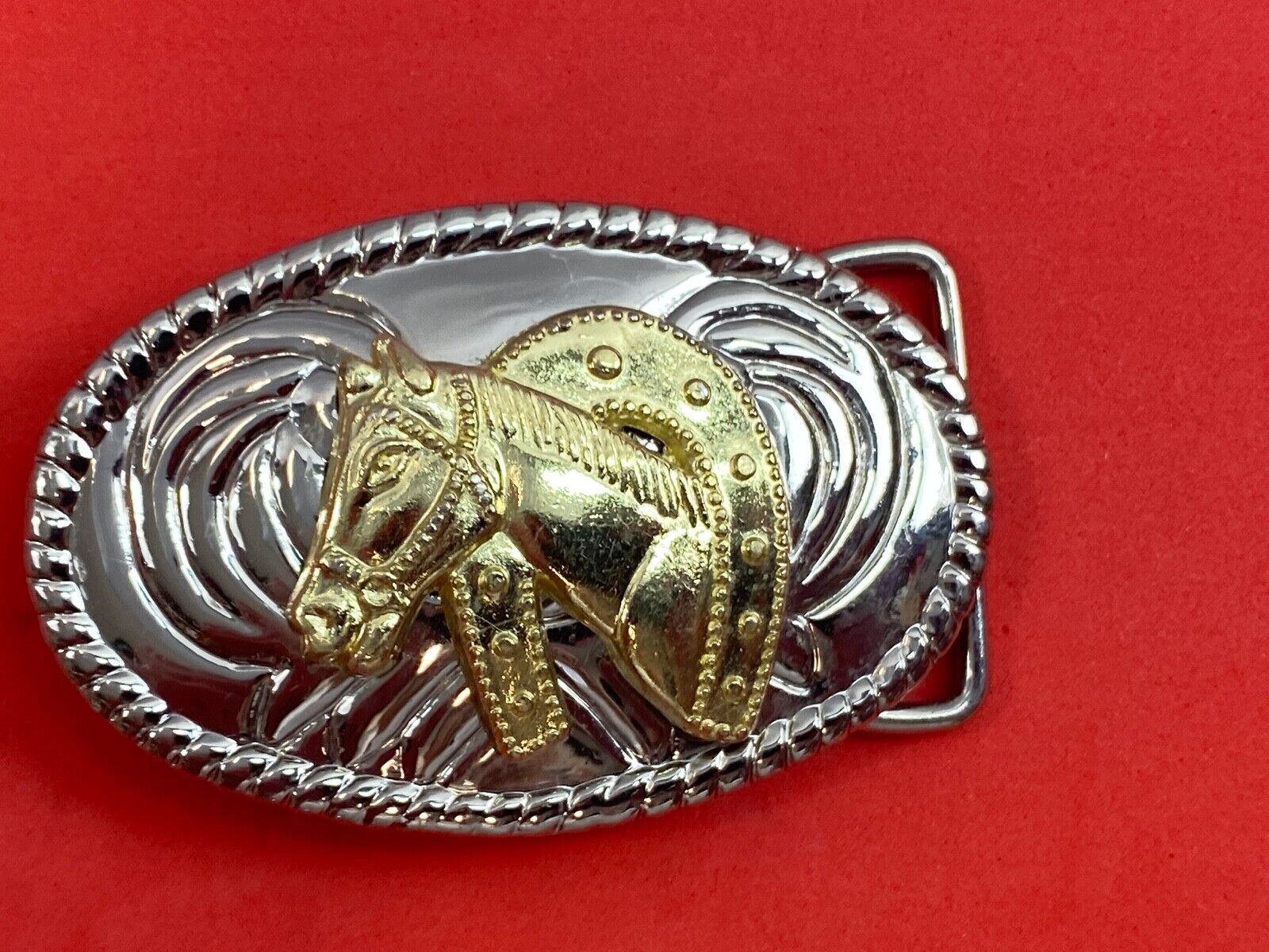 Two toned HORES HEAD BUST inside horseshoe western cowboy oval belt buckle