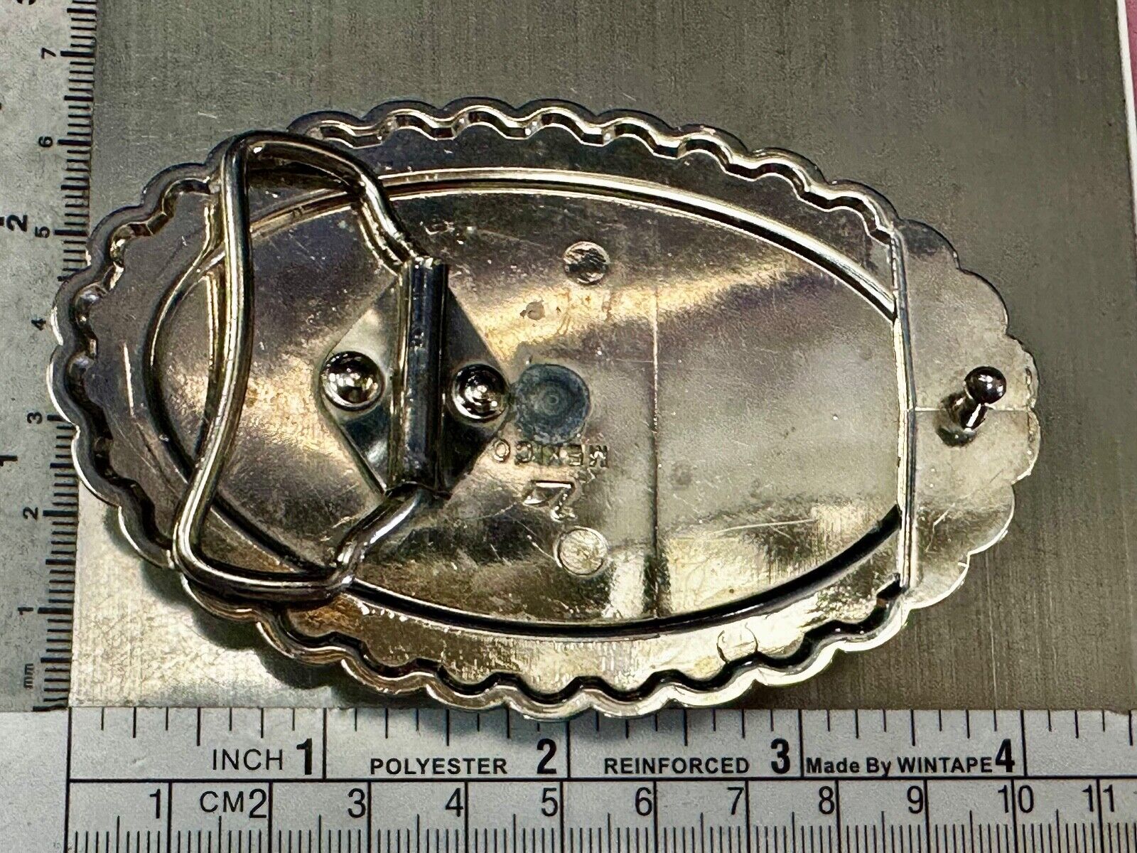 Two horse heads - Vintage two tone oval Belt Buckle with reflective backing