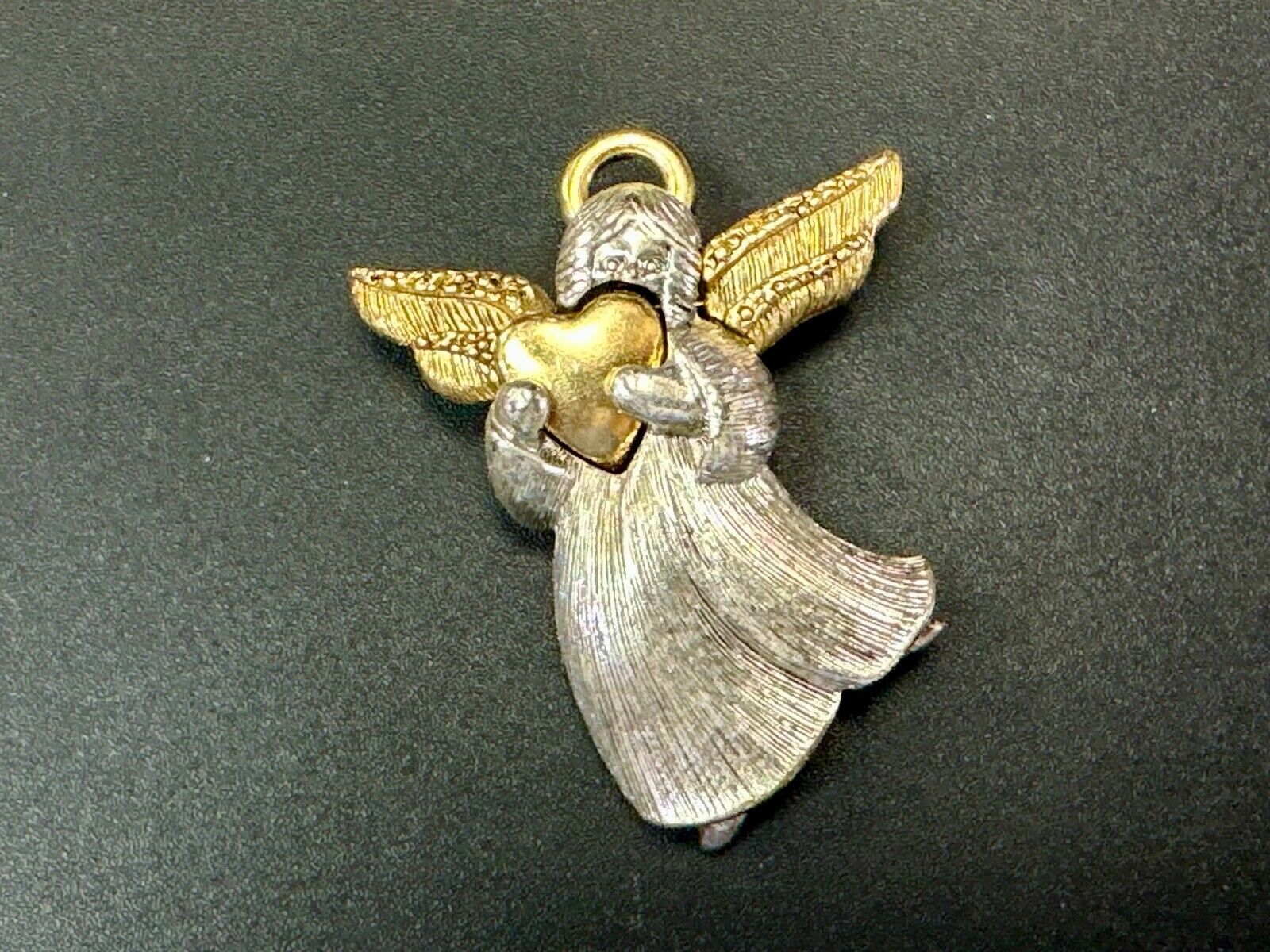 Angle holding heart -vintage two tone LC Liz Claiborne Signed Brooch Pin