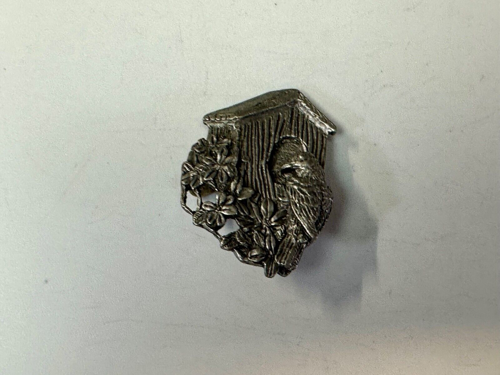 Bird flying to birdhouse - vintage birds and blooms pewter pin