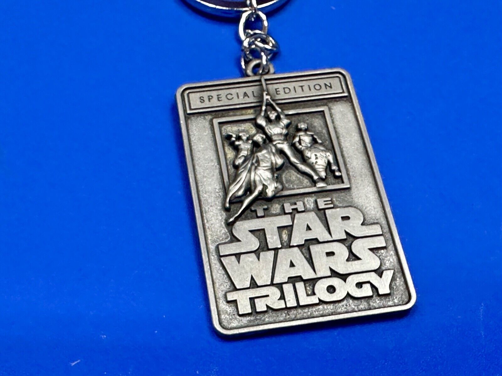 The Star Wars Trilogy Logo Emblem NOS Keychain!