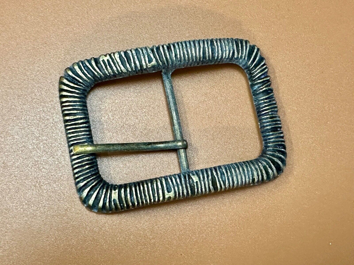 Unique Center Bar Spring abstracted wrapped style rectangular belt buckle