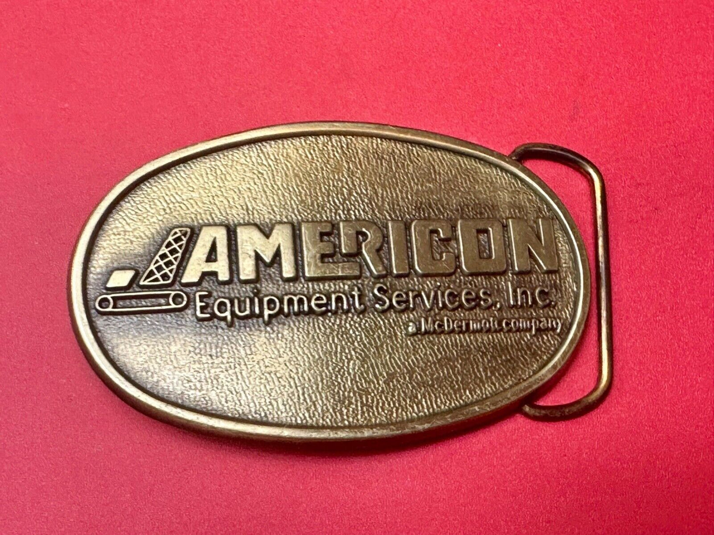 American Equipment services inc - McDermor Company Promotional belt buckle