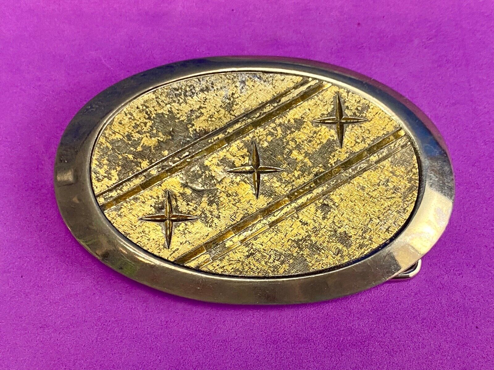 Unique XXX gold tone belt buckle tic tac toe pattern