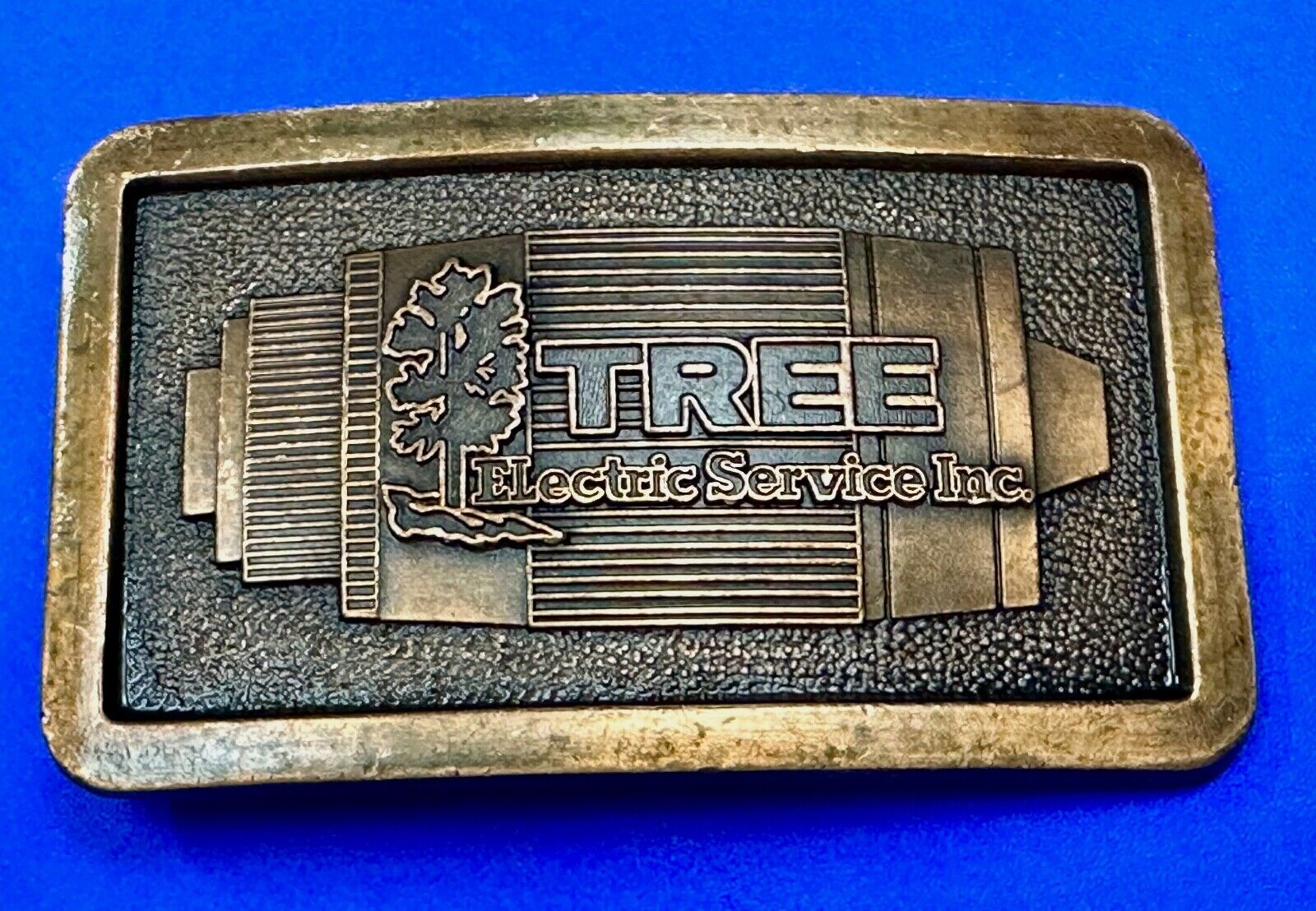 Tree electric service INC  Vintage advertising promo brass tone Belt Buckle