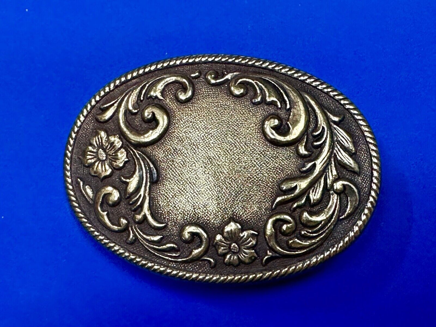 USA made vintage western flower swirl design oval belt buckle marked W