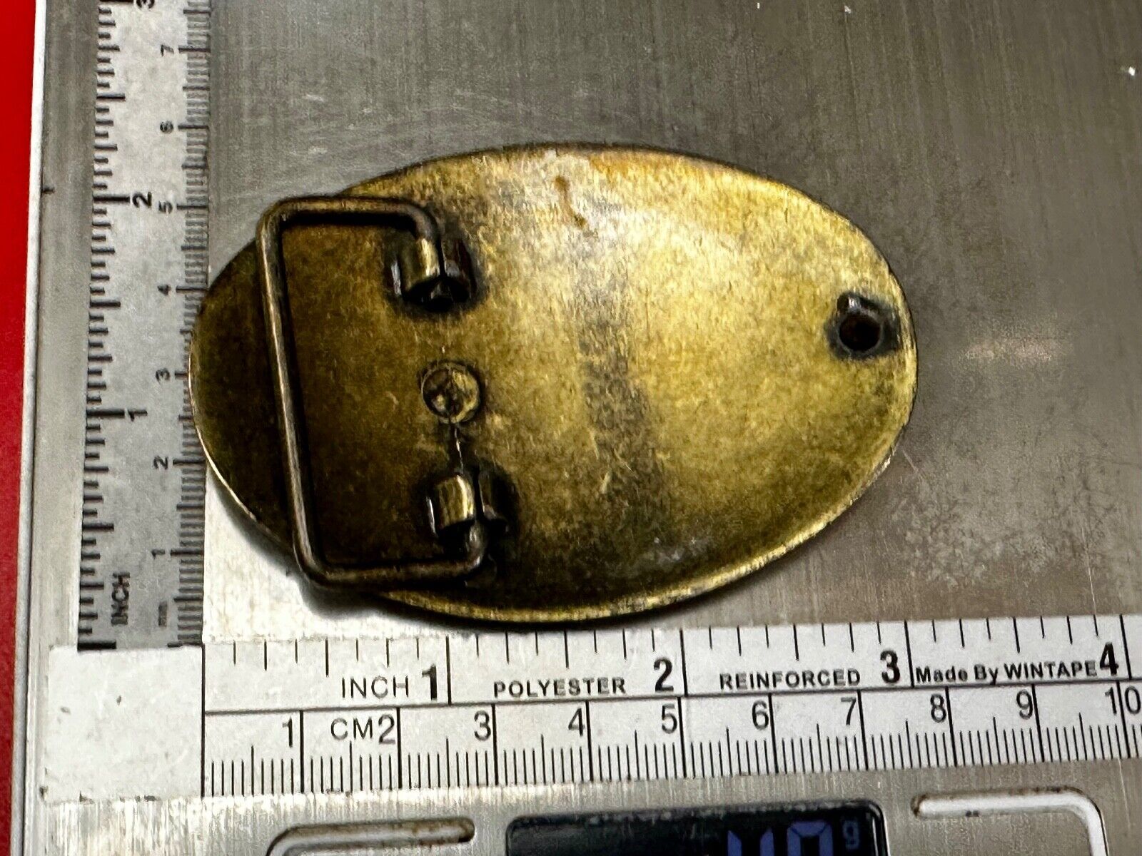 Vintage black and gold tone western flower floral theme cowboys belt buckle