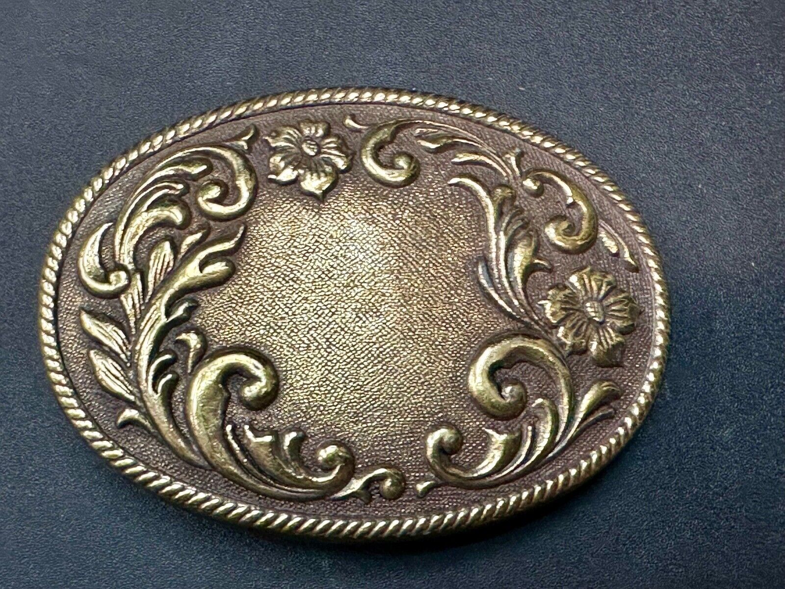 USA made vintage western flower swirl design oval belt buckle marked W