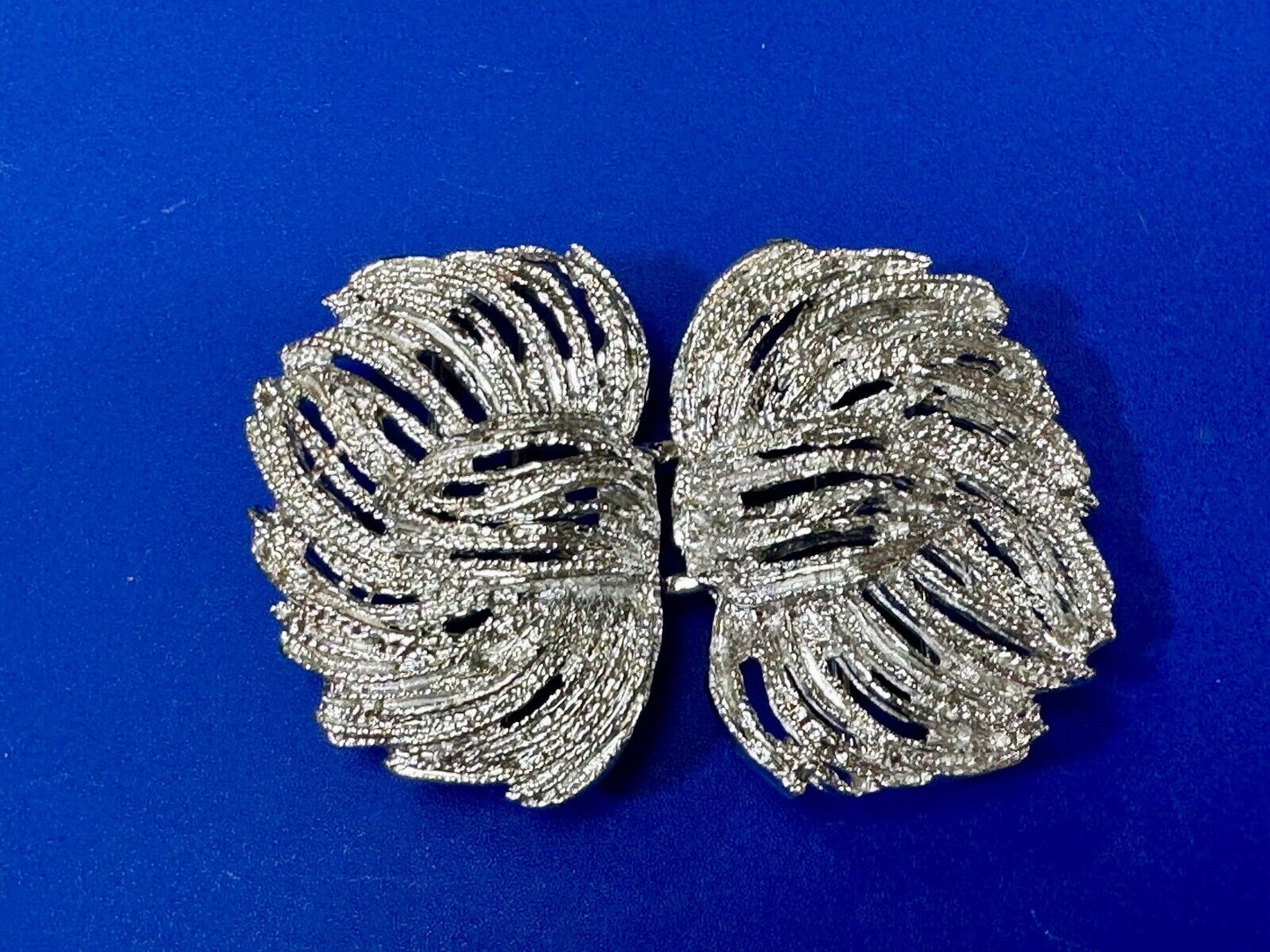Two piece interlocking sea leaf brushed pattern see through pattern belt buckle