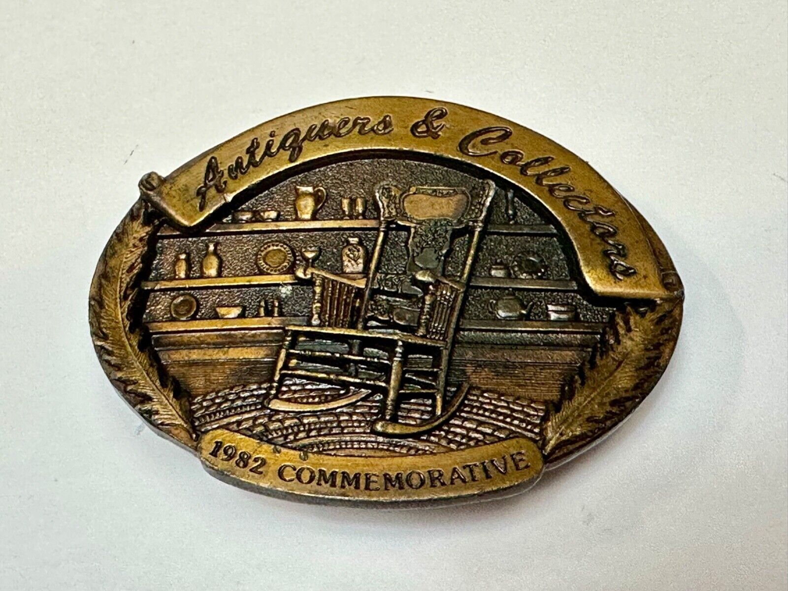 Antiques and collectables dealers 1982 Commemorative rocking chair belt buckle