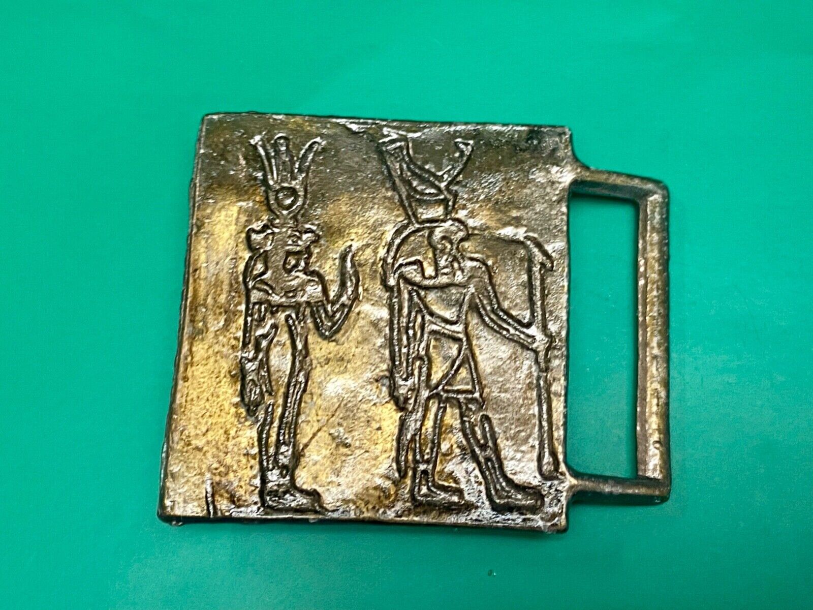 Two Tribal Warriors Indian figures?  accoral marked numbered belt buckle