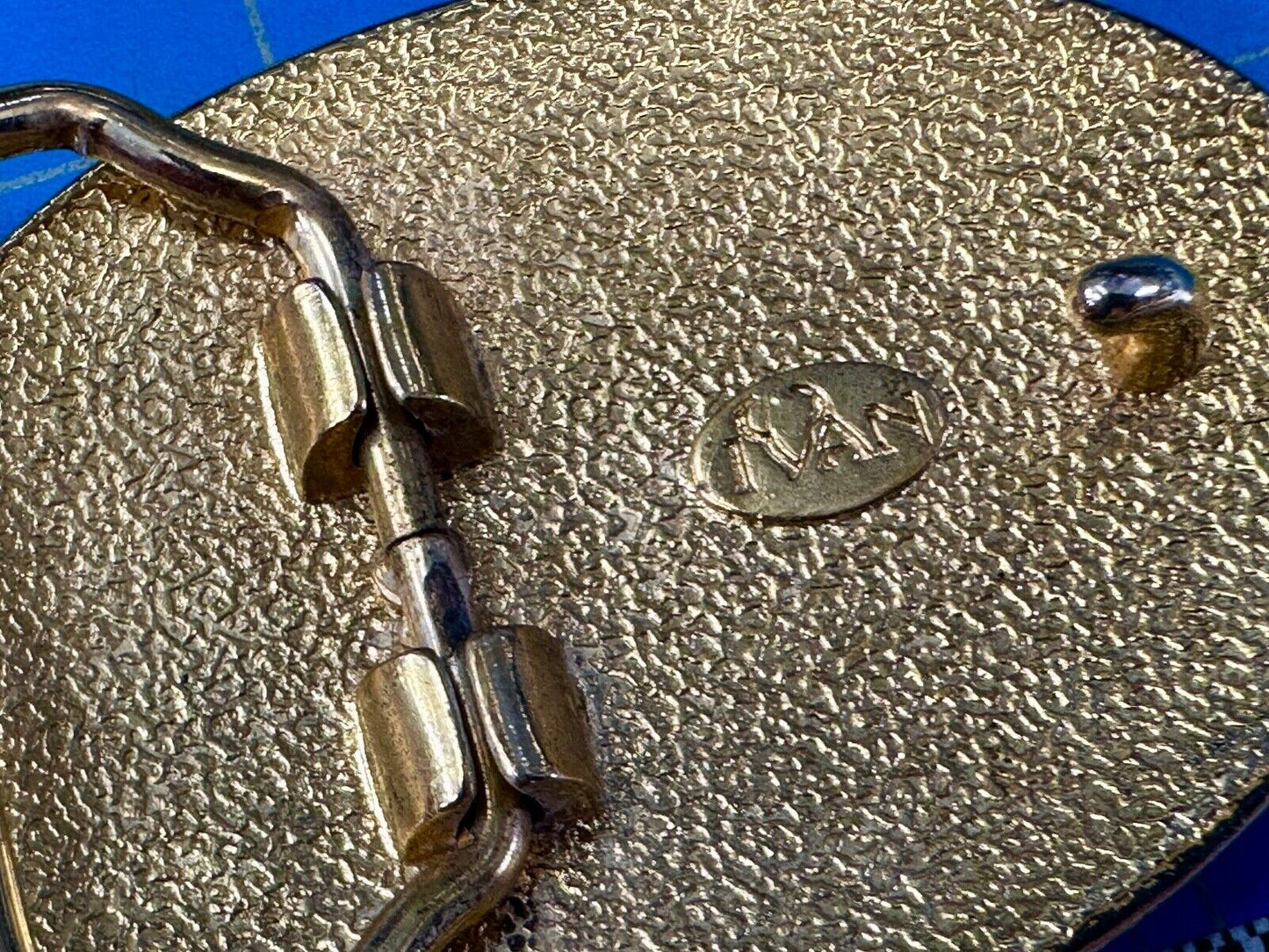 vintage Ivan Brand western flower swirl design two tone oval belt buckle