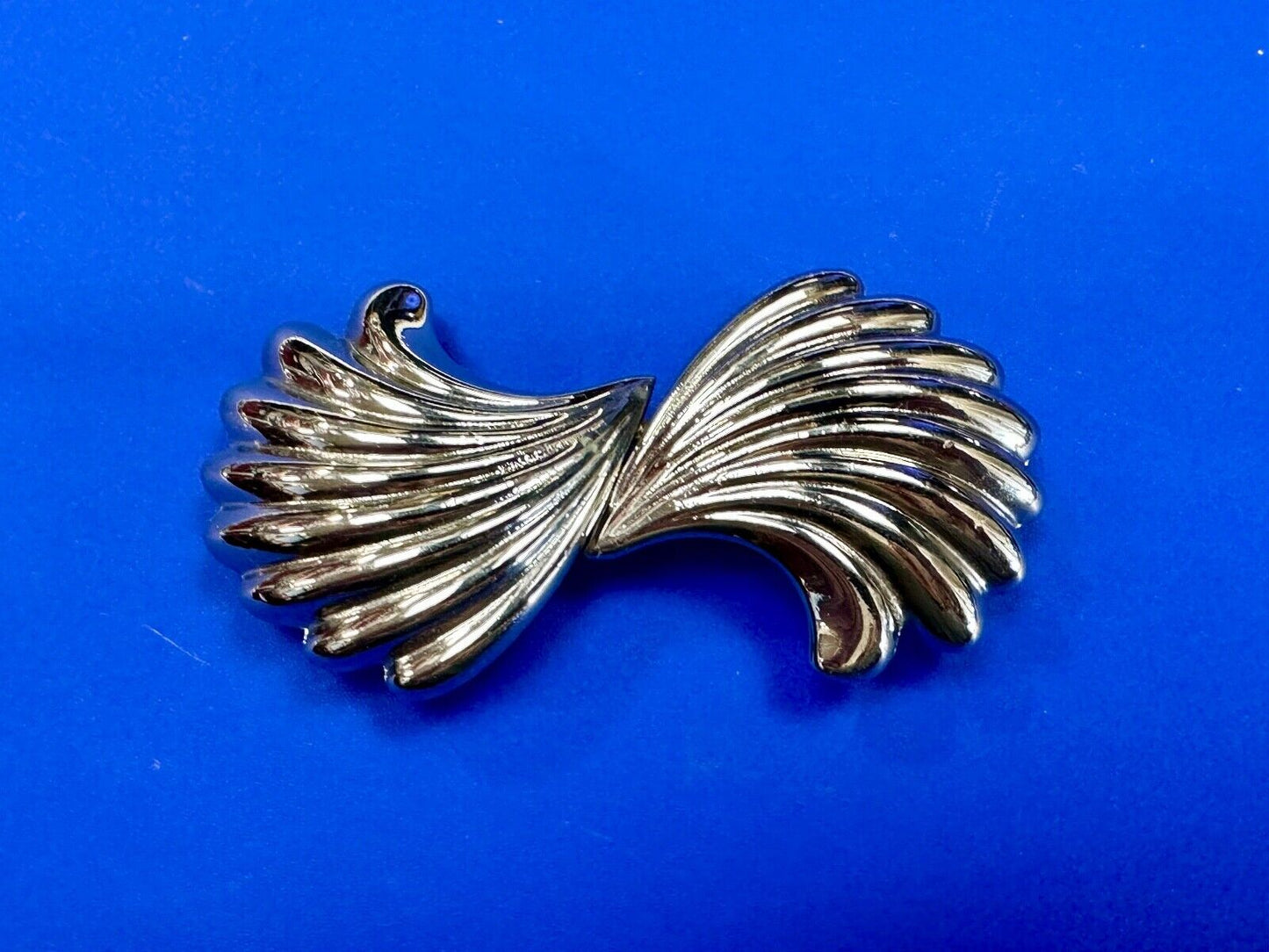 Two-piece interlocking gold color belt buckle by Dotty Smith