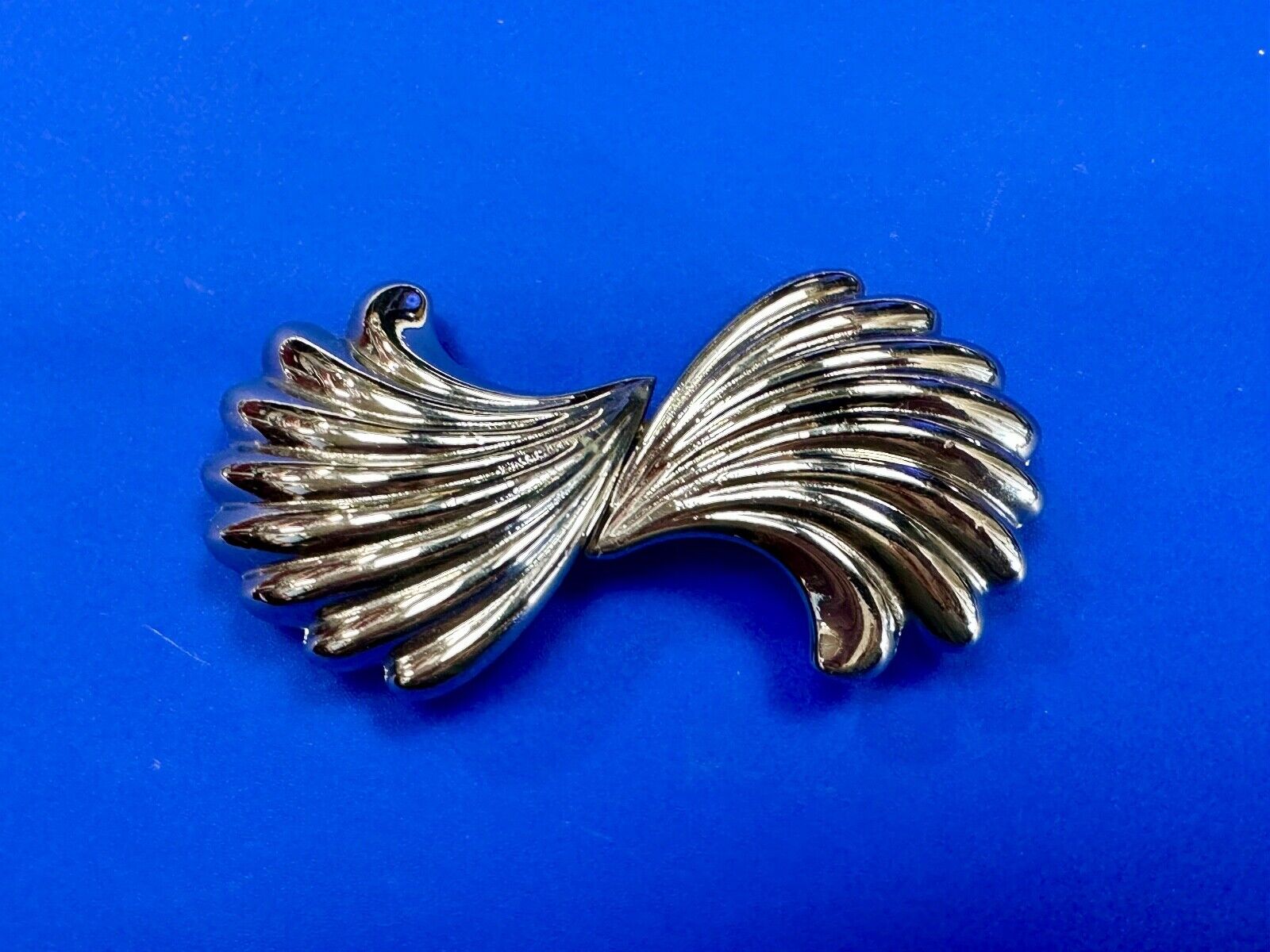 Two-piece interlocking gold color belt buckle by Dotty Smith