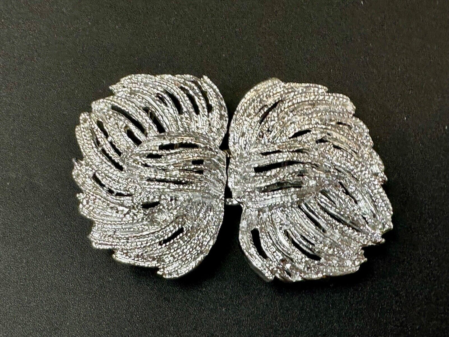 Two piece interlocking sea leaf brushed pattern see through pattern belt buckle
