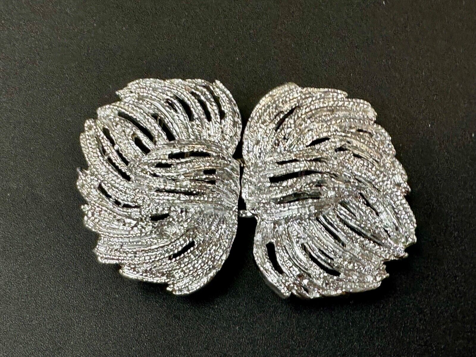 Two piece interlocking sea leaf brushed pattern see through pattern belt buckle