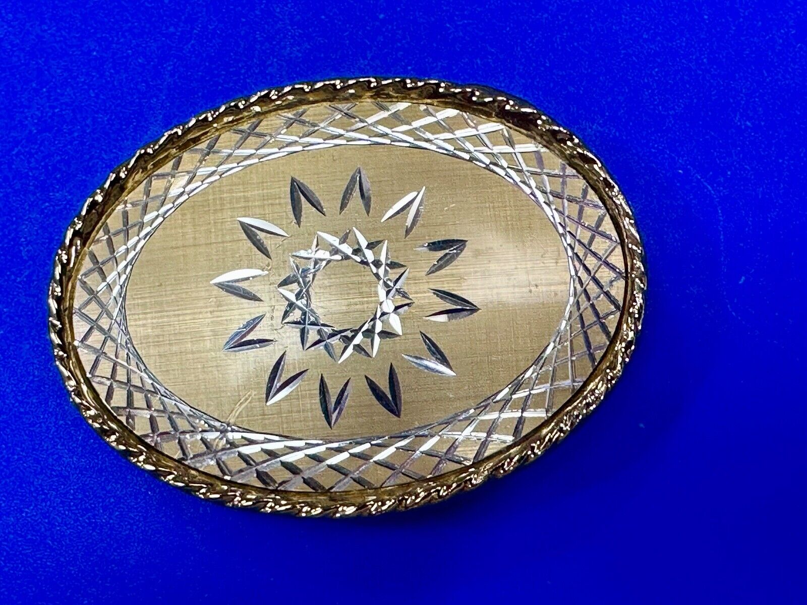 vintage gold tone starburst design oval belt buckle marked W