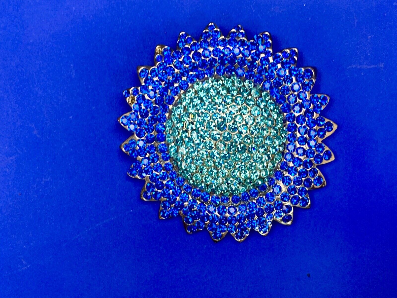 A Blue Green Sea Of Rhinestones - Starburst Cutout Belt Buckle