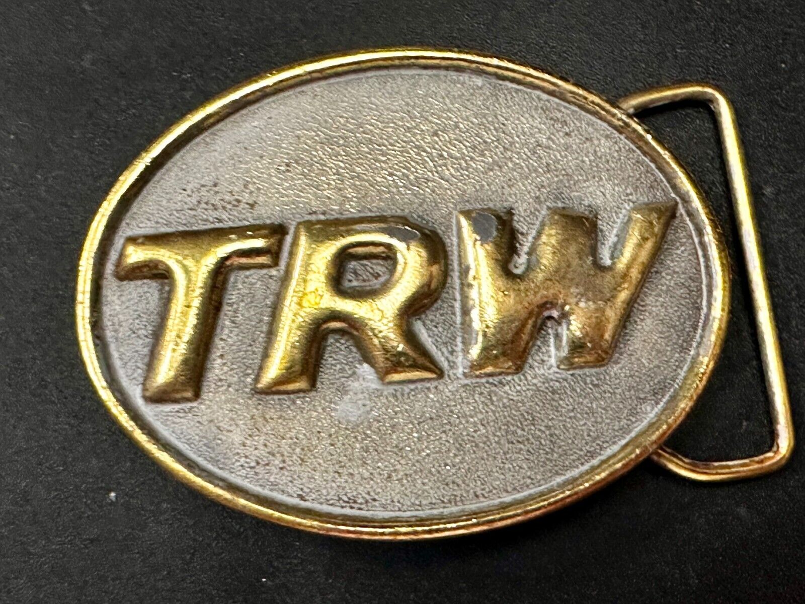 TRW Automotive Parts Advertising Vintage Belt Buckle by Indiana Metal Craft