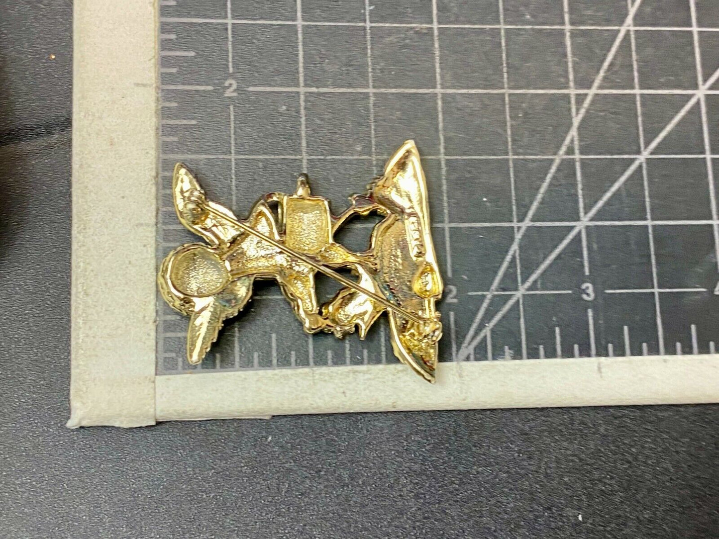Angle Watering Flower Garden Plants Cupid Brooch Pin Signed AJC 