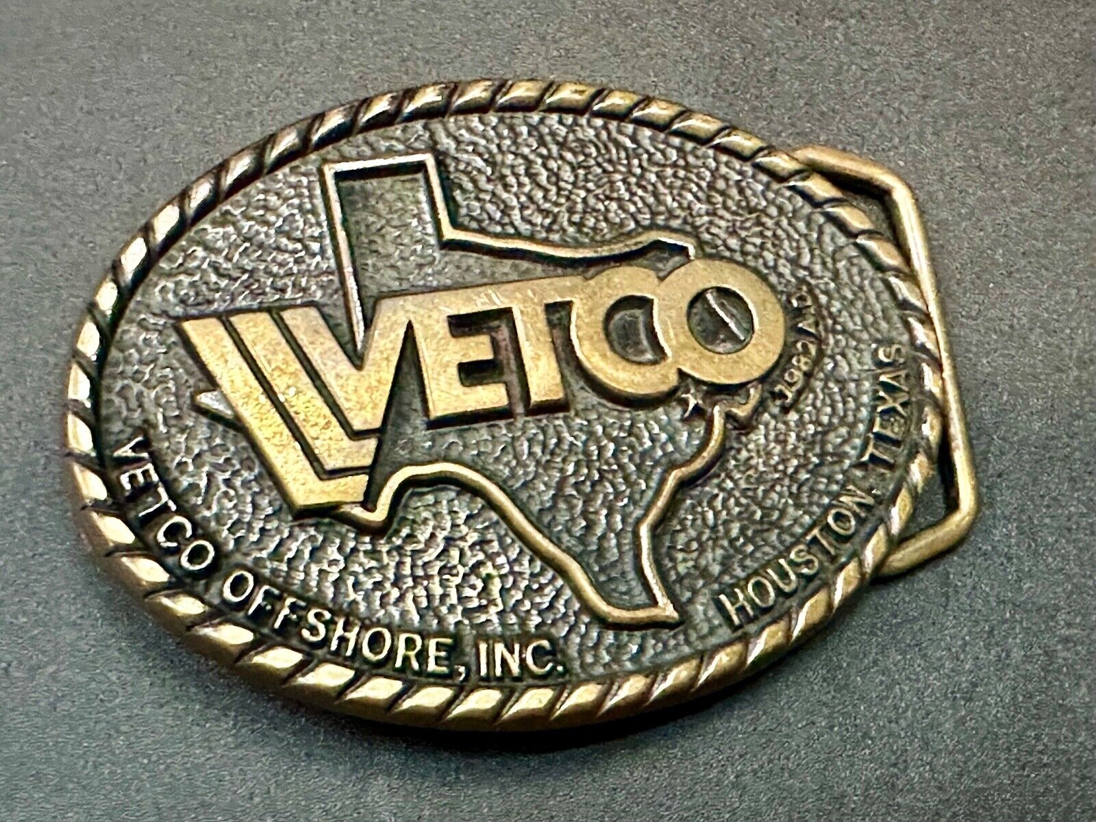 VETCO Houston Texas OffShore Inc animal health Vintage solid brass belt buckle