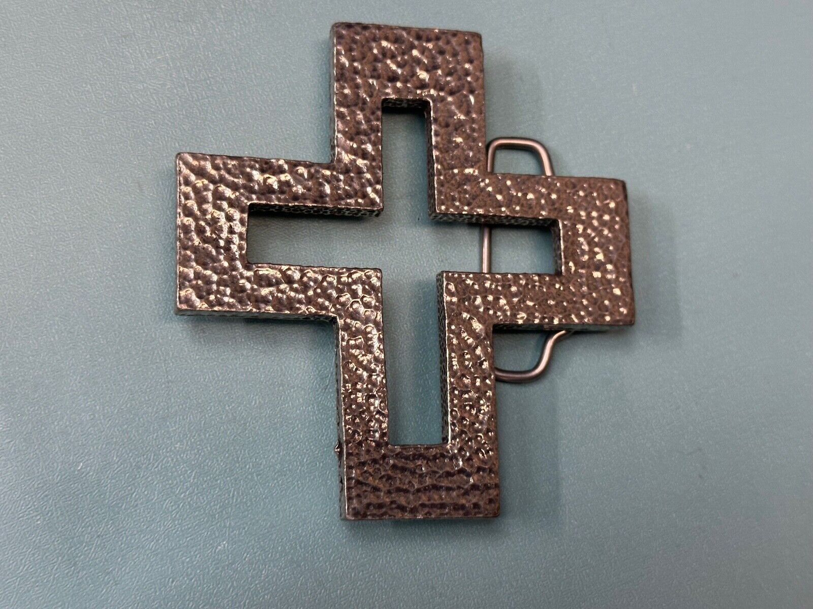 A.P.W. 2007 cross cutout silver tone belt buckle