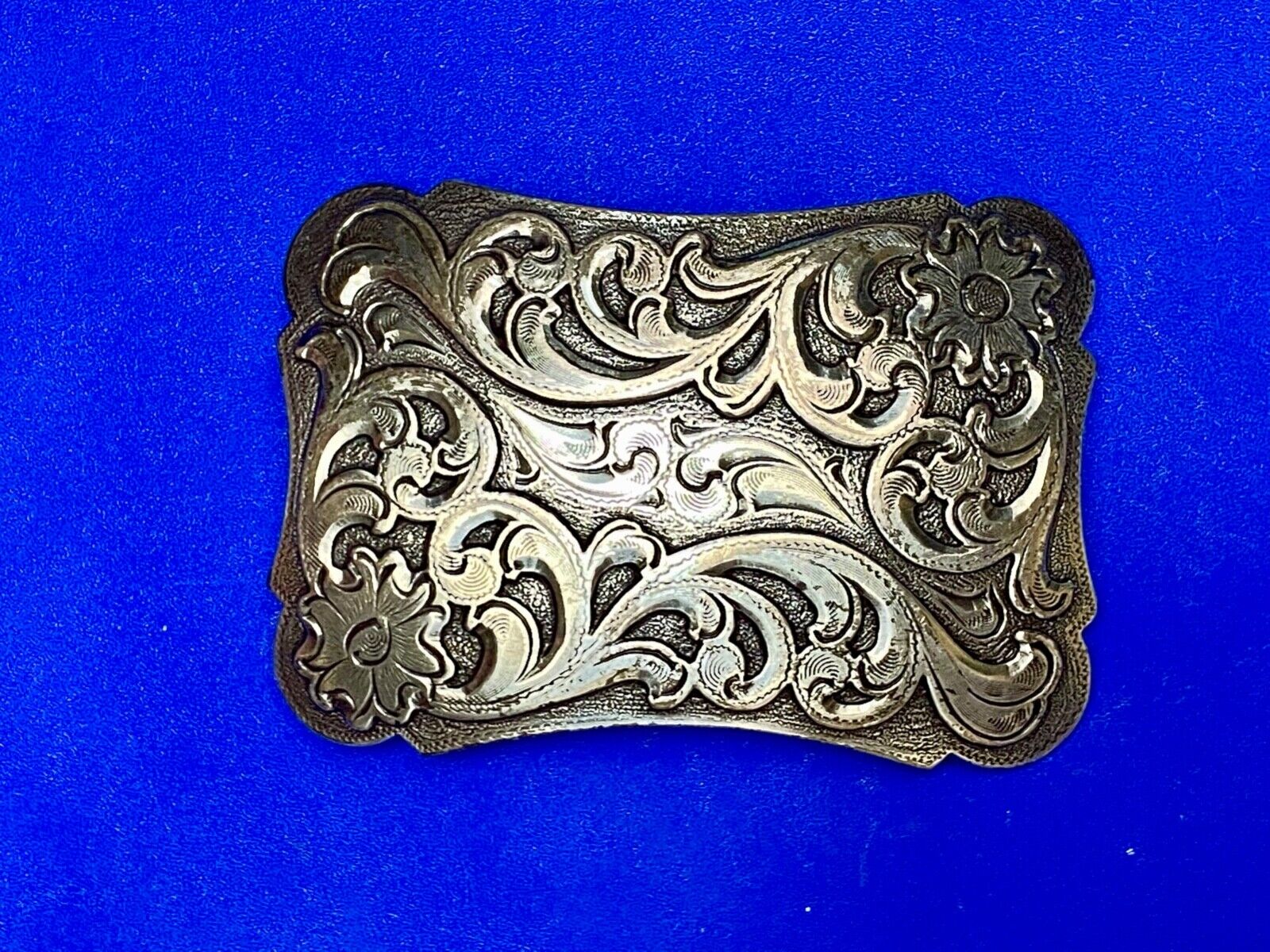 Thick flower swirl silver color western belt buckle